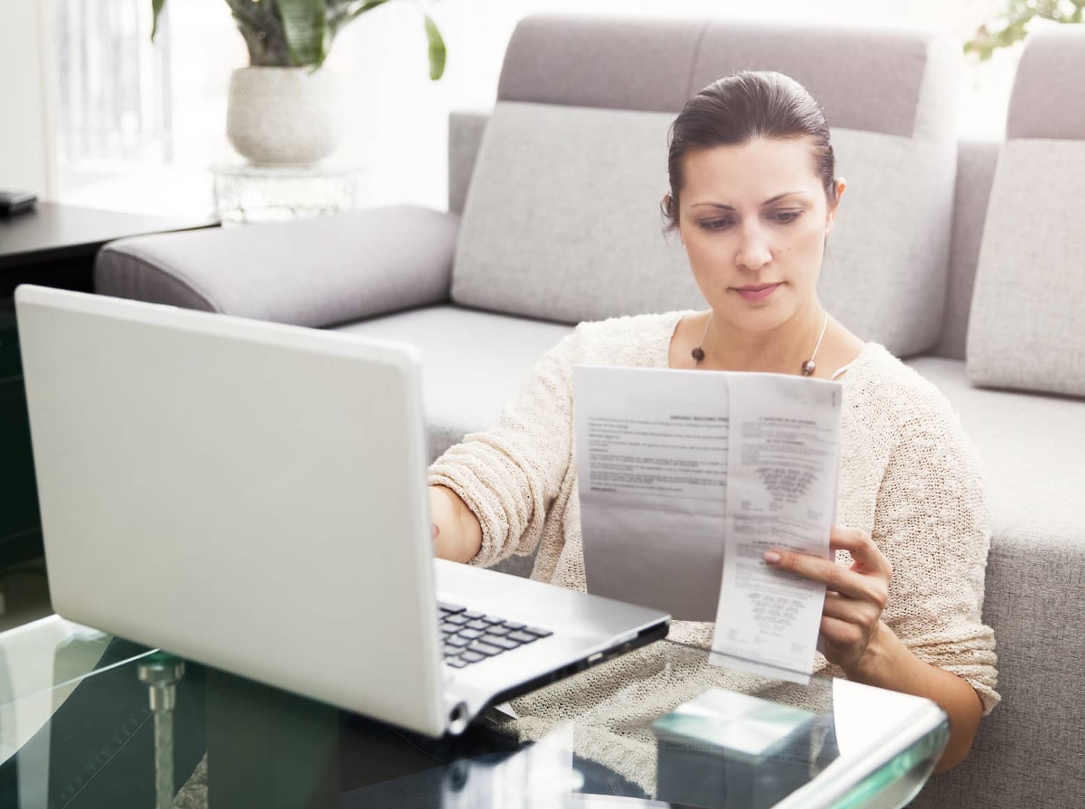 lady looking at a list of payroll services near me