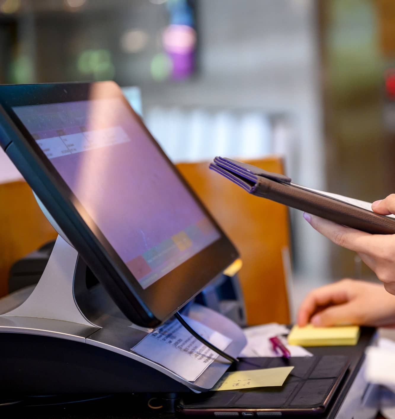 employees working on Clover POS systems for small business