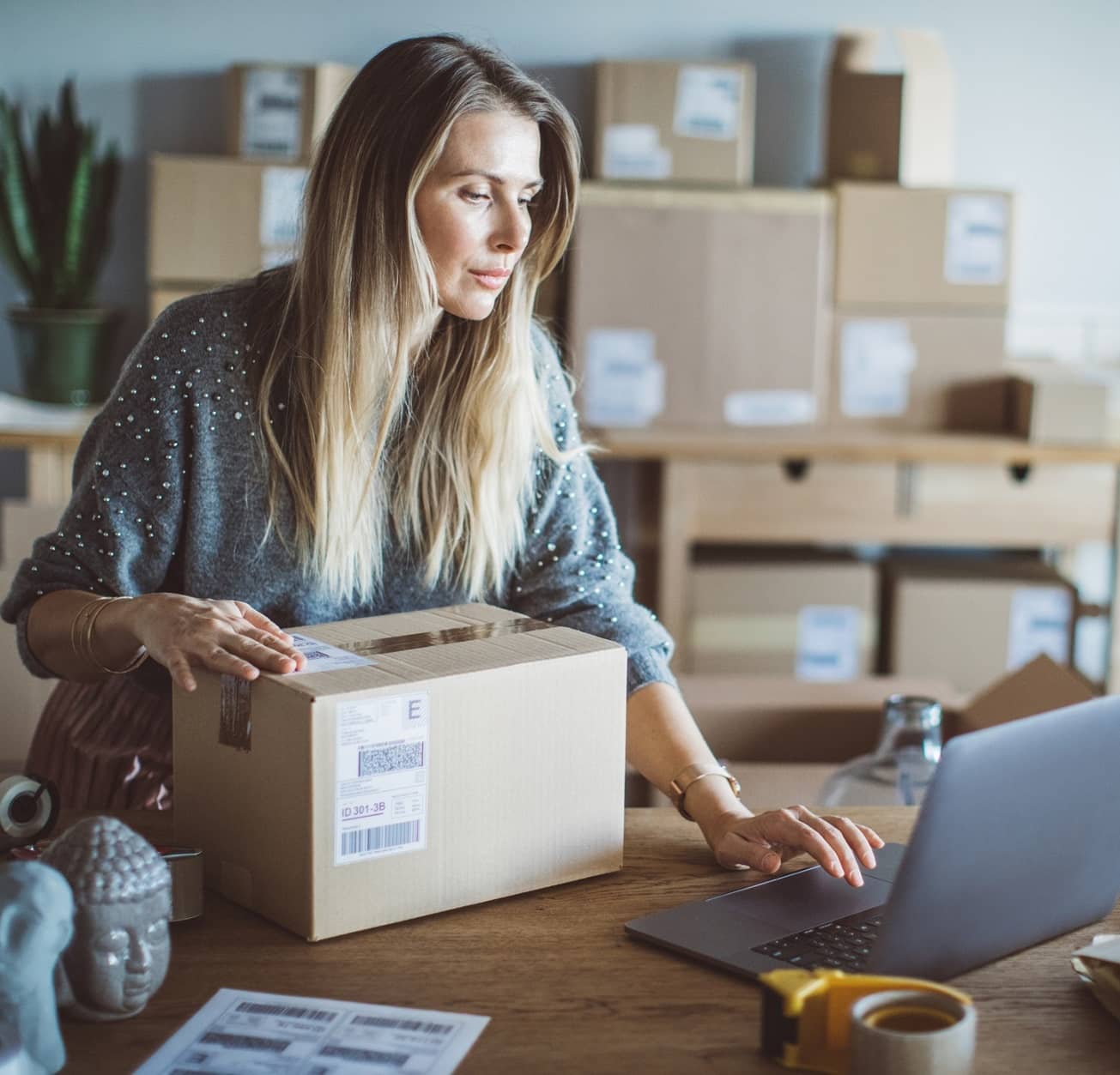 woman looking at her ecommerce website woman looking at her ecommerce website